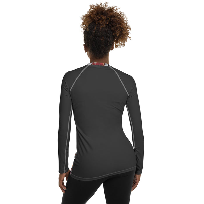 woman wearing art printed top from the back.  Black back of ga gardner designed worman 